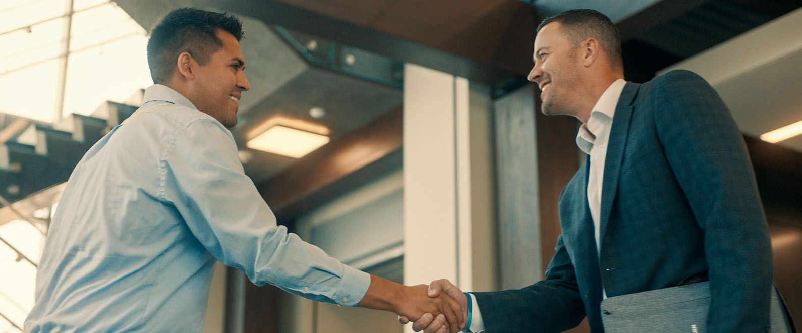 Two business men shaking hands